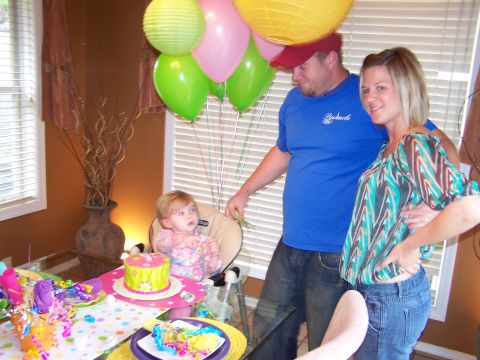 1978 Ford Bronco - A family celebrates a birthday with a cake and balloons.