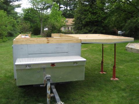 1996 Ford Bronco - A trailer is being modified with a wooden frame, a diamond plate toolbox on the front.
