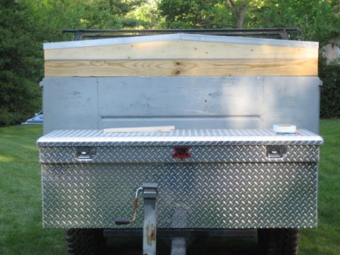 1996 Ford Bronco - Trailer rear view showing a diamond plate toolbox and a custom wooden top section.