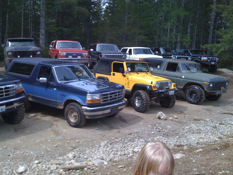 1992 Ford Bronco parked with other SUVs and trucks