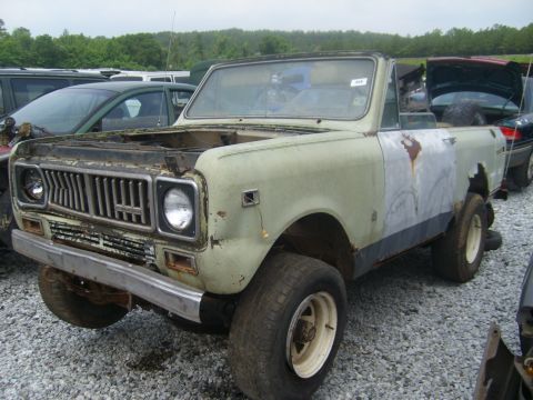 1994 Ford Bronco - This International Harvester Scout II shows significant wear and tear, with visible rust and body repairs.