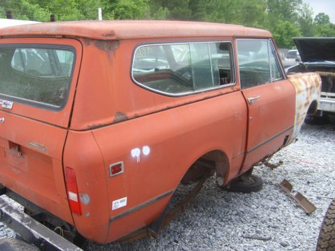 1994 Ford Bronco - This old International Scout II is missing its front end and wheels, showing significant rust and wear.