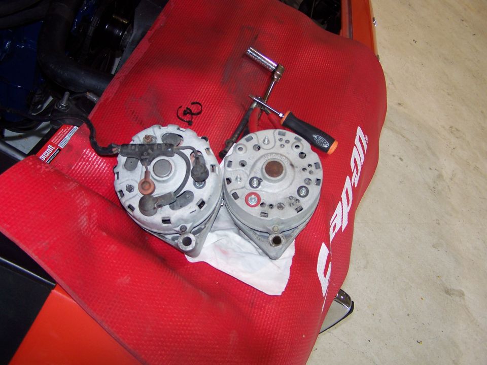 swapping alternators; I had a good used spare Motorcraft 60 amp alternator so I retired the Autolite due to not charging anymore.