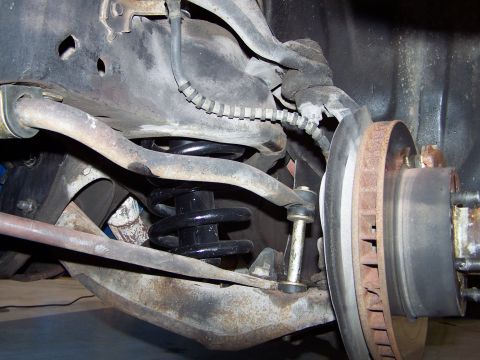 1973 Ford Ranchero - front coil spring installed.