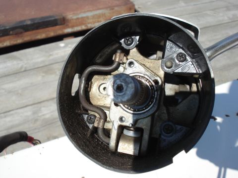 1979 Ford Bronco - Close-up view of the internal components of a steering column tilt mechanism.