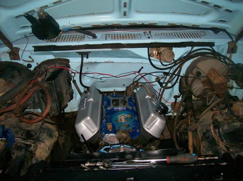 1982 Ford Bronco - Close-up view of a vehicle's engine bay, showing the motor and associated components.