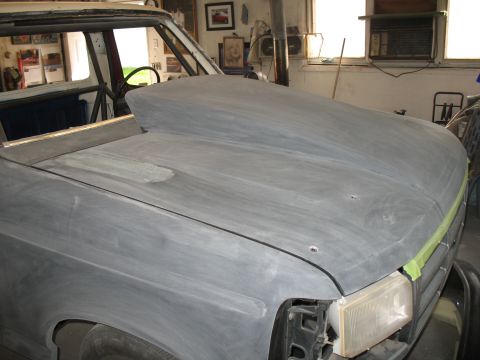 1994 Ford F-150 - This 1994 Ford F-150 is undergoing bodywork, a custom hood scoop.