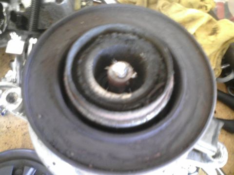 1986 Ford Bronco - Close-up view of a brake rotor and hub assembly, likely from a vehicle's front end.