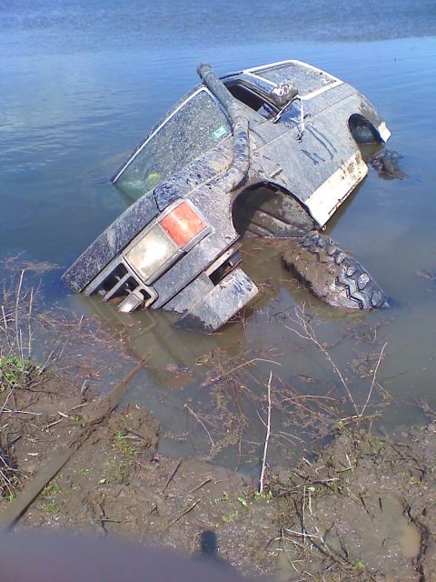 1990 Ford Bronco - This 1990 Ford Bronco is stuck in the water with its snorkel attached.