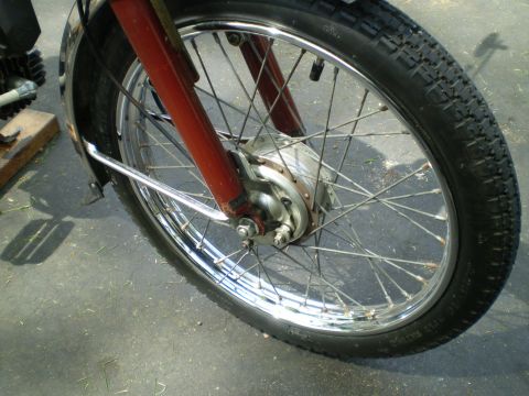 1981 Garelli Rally Sport - The front wheel assembly of a motorcycle, showing the tire, spokes, and brake drum.