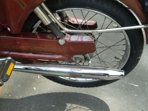 1981 Garelli Rally Sport - Rear wheel and exhaust detail of a moped, showing the 'SuperSport xl' designation.