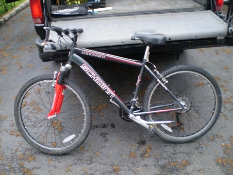 1981 Garelli Rally Sport - A Schwinn Ranger mountain bike is shown parked next to the open tailgate of a pickup truck.