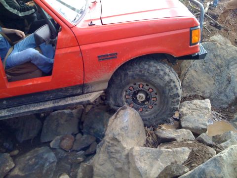1989 Ford Bronco - This 1989 Ford Bronco is shown navigating a challenging rocky obstacle course.