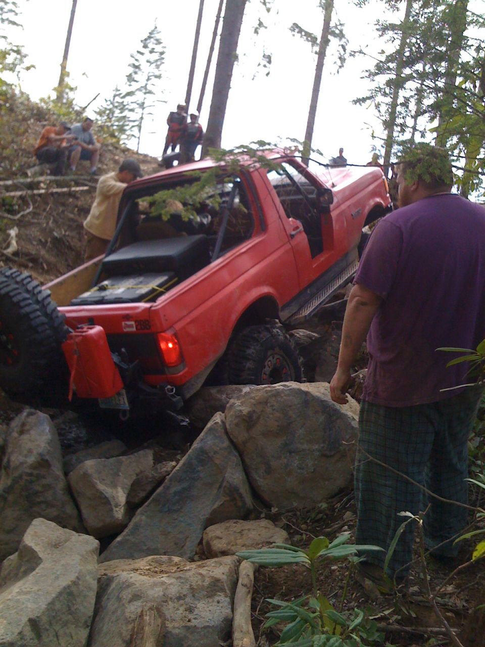 1989 Ford Bronco off-roading over rocks