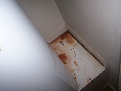 1978 Ford Bronco - Water damage is visible on the wall next to a white water heater.