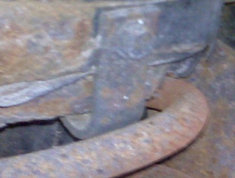 1995 Ford Bronco - Detail of corroded metal parts, showing significant rust and wear.