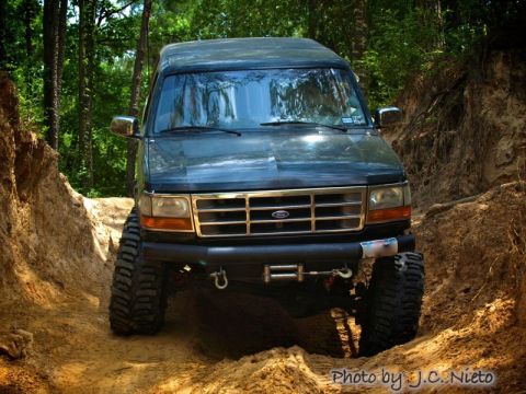 1995 Ford Bronco - This 1995 Ford Bronco navigates a challenging off-road trail, its capabilities.