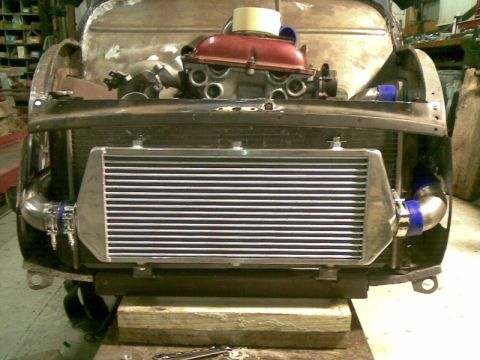 1969 MINI Cooper - Intercooler installation on a Mini Cooper, showing engine and front end components.
