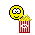1989 Ford Bronco - A whimsical emoji depicts a happy face tumbling into a container of popcorn.