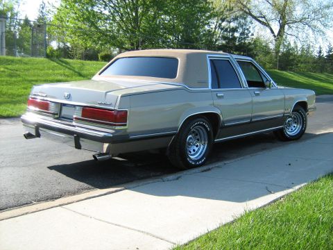 1988 Mercury Grand Marquis - This 1988 Mercury Grand Marquis is seen from the rear, parked on a suburban street.