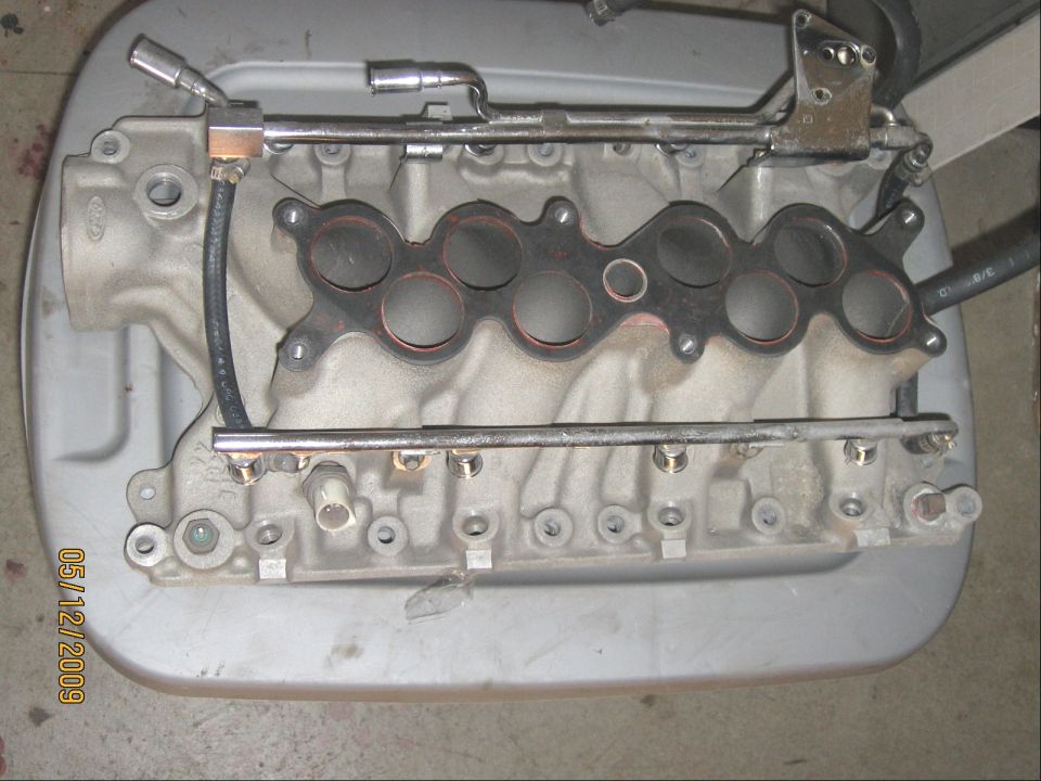 Ford V8 intake manifold with fuel rails and injectors removed