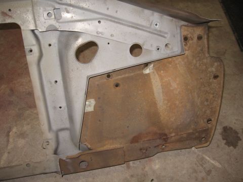 1966 Ford F-100 - This photo shows a section of a vehicle's firewall and inner fender, with significant rust on the fender panel.