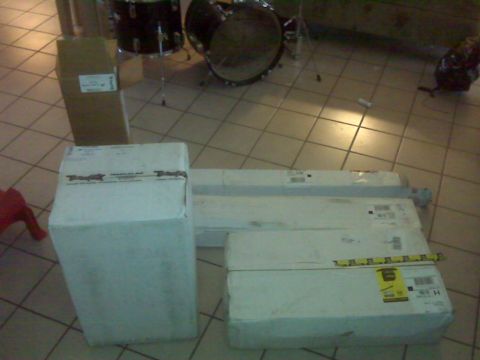 2008 Jeep Wrangler - Boxes and a drum set are visible on the floor, with some text on the boxes.