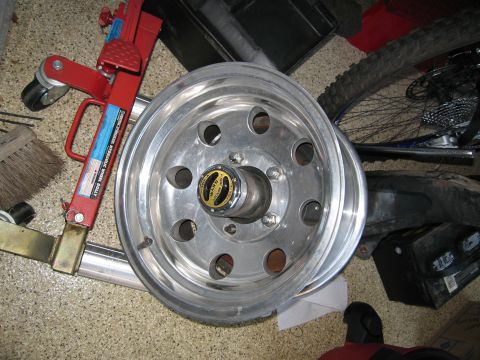 1986 Ford Bronco - Close-up of an alloy wheel with a Warn locking hub, likely for a 4x4 vehicle.