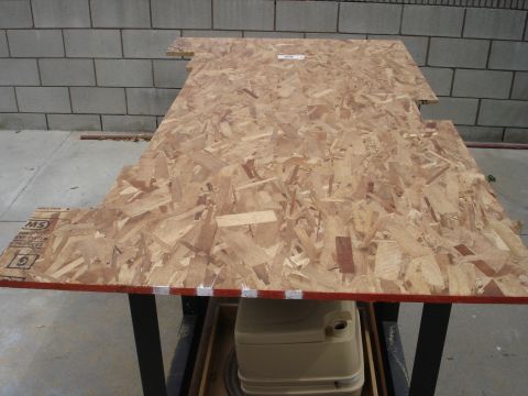 1995 Ford Bronco - OSB board cut to shape, placed on a table above a portable toilet.