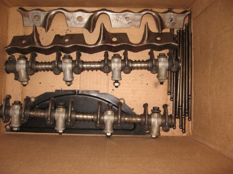 1966 Ford F-100 - Engine valve train components laid out in a box, likely for rebuild or detail.