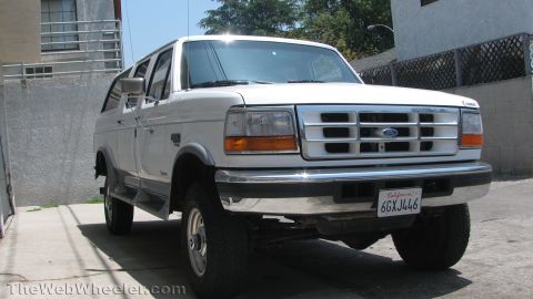 1996 Ford C-350 (Centurion Conversions) - This 1992 Ford Bronco is shown from a three-quarter front view, parked in an outdoor setting.