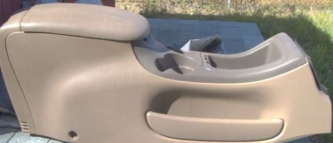 2007 Ford Mustang - Car center console part with armrest and cup holders, removed from vehicle.