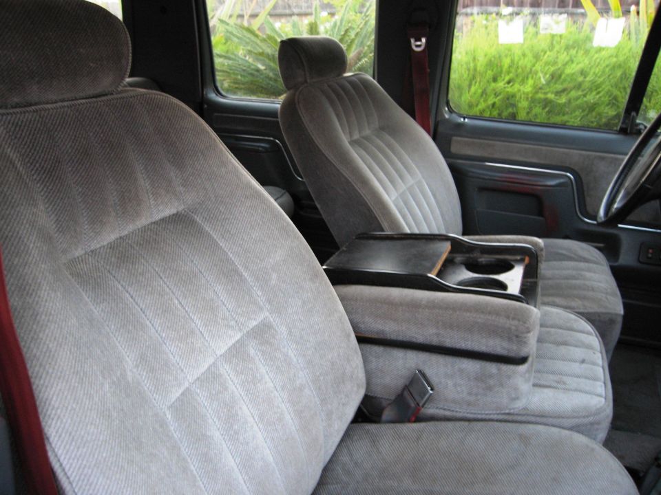 1986 Ford Bronco front seats and center console with cup holders