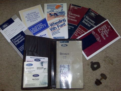 1995 Ford Bronco - A collection of Ford vehicle manuals and documents, including a 1995 Bronco owner's guide.