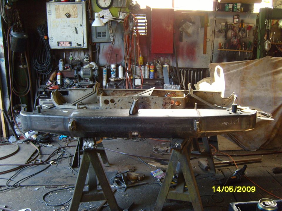 Ford Bronco rear bumper assembly on sawhorses in a workshop. Date stamp 14/05/2009
