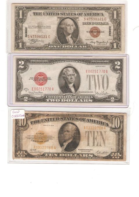 1995 Ford Bronco - Collection of US dollar bills including one, two, and ten dollar denominations.