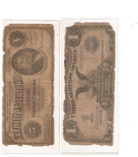 1995 Ford Bronco - Two antique United States dollar bills are shown, one a five-dollar certificate and the other a one-dollar silver certificate.