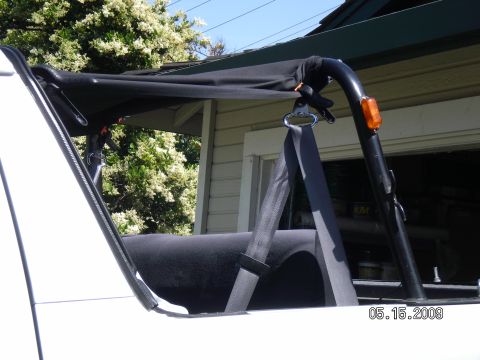 1996 Ford Bronco - Only mocked up the soft top 2-days ago but the front is velcro'd to the hardtop channel and I installed screws through the snaps & into the…