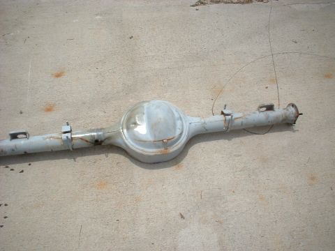 1970 Ford Torino - Rear axle assembly, likely from a classic car, shown on concrete.
