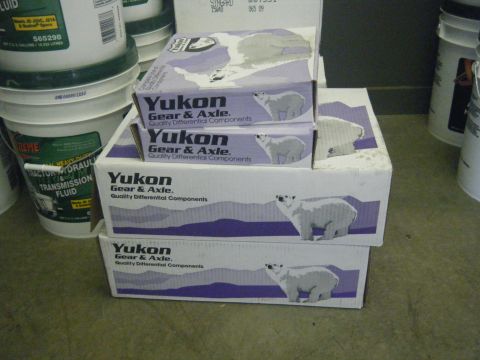 1978 Ford Bronco - Several boxes of Yukon Gear & Axle differential components are stacked, polar bear illustrations.