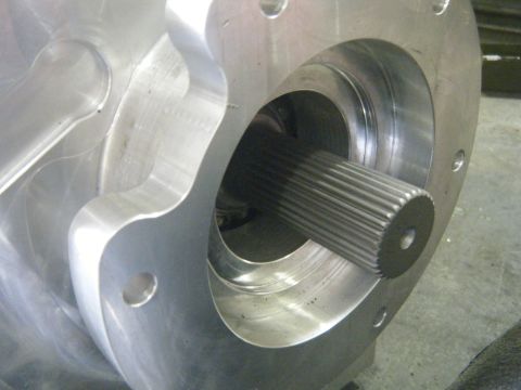 1978 Ford Bronco - Machined metal part a splined shaft. No vehicle is visible in this image.