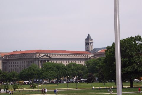 2001 Ford Crown Victoria - A view of buildings and a park in Washington DC, with people enjoying the outdoors.