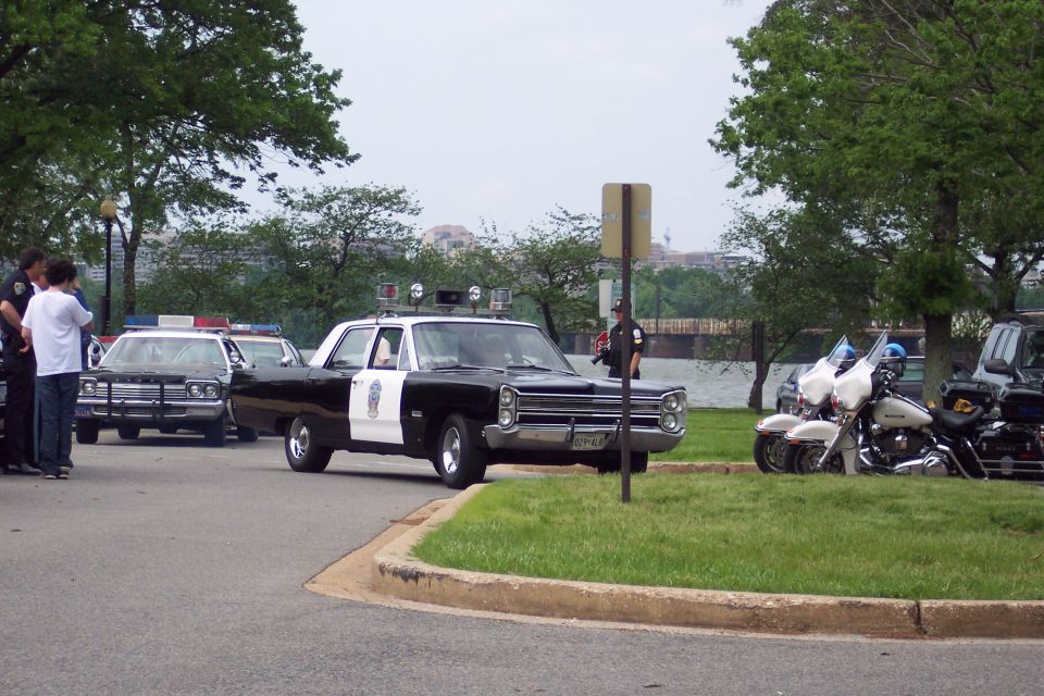 1967 Plymouth Fury police car, black and white, with light bar