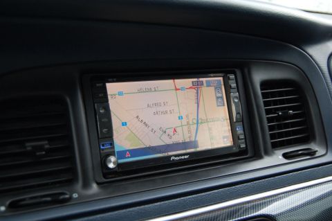 1985 Mercury Grand Marquis - Interior view of a car dashboard a Pioneer GPS navigation system.