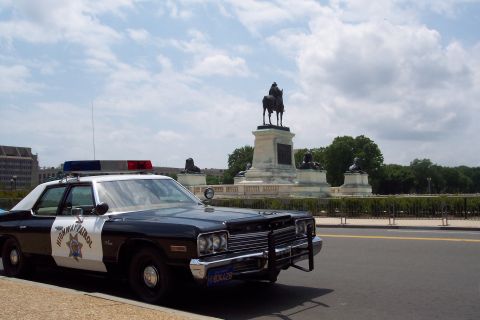 2001 Ford Crown Victoria - This 1977 Dodge Monaco police car is parked near a monument in Washington DC.