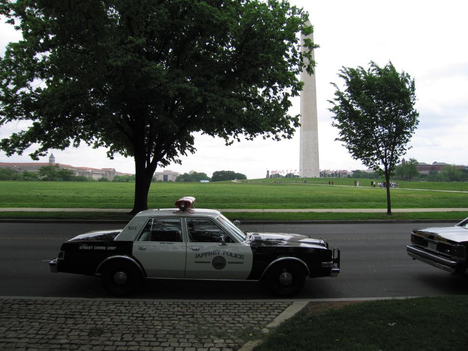 Black-and-white Jasper Police Street Crime Unit cruiser parked near the Washington Monument