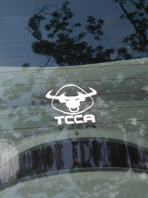 1999 Ford Taurus - A close-up of a bull logo with the text 'TCCA' underneath it.