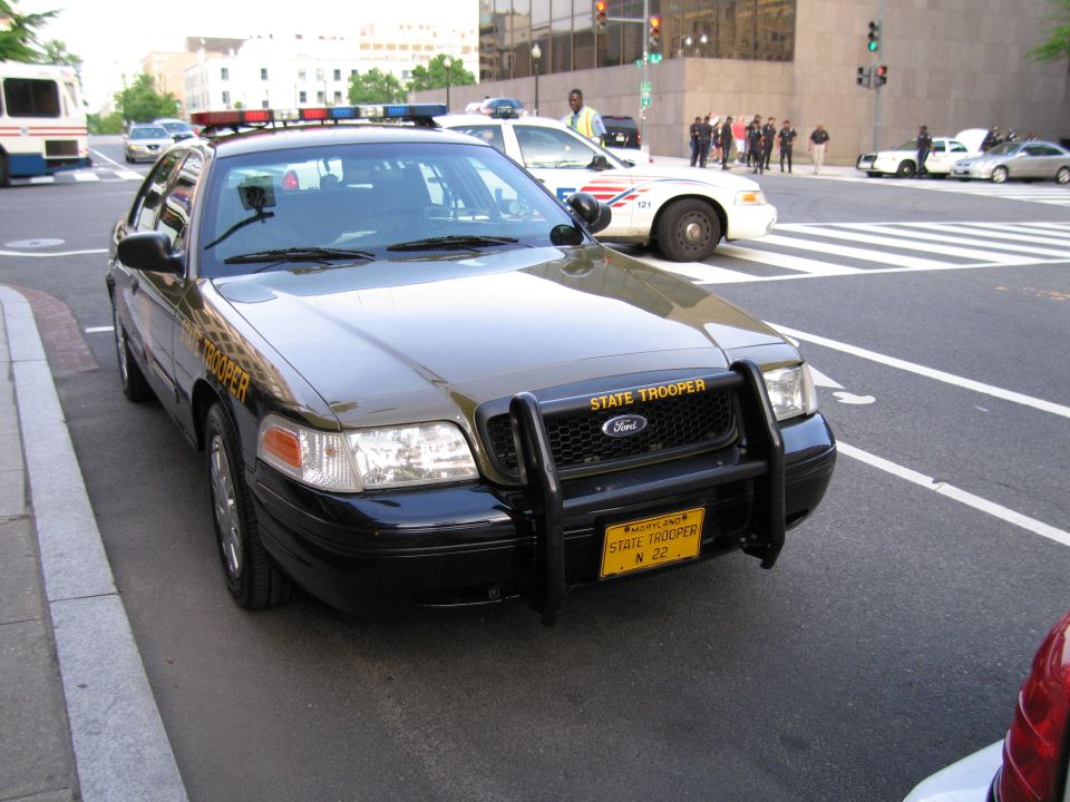 Maryland State Trooper Ford with push bar at a city intersection