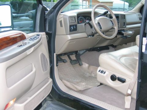 1992 Ford Mustang - Interior view of a truck, highlighting the dashboard, steering wheel, and driver's seat.