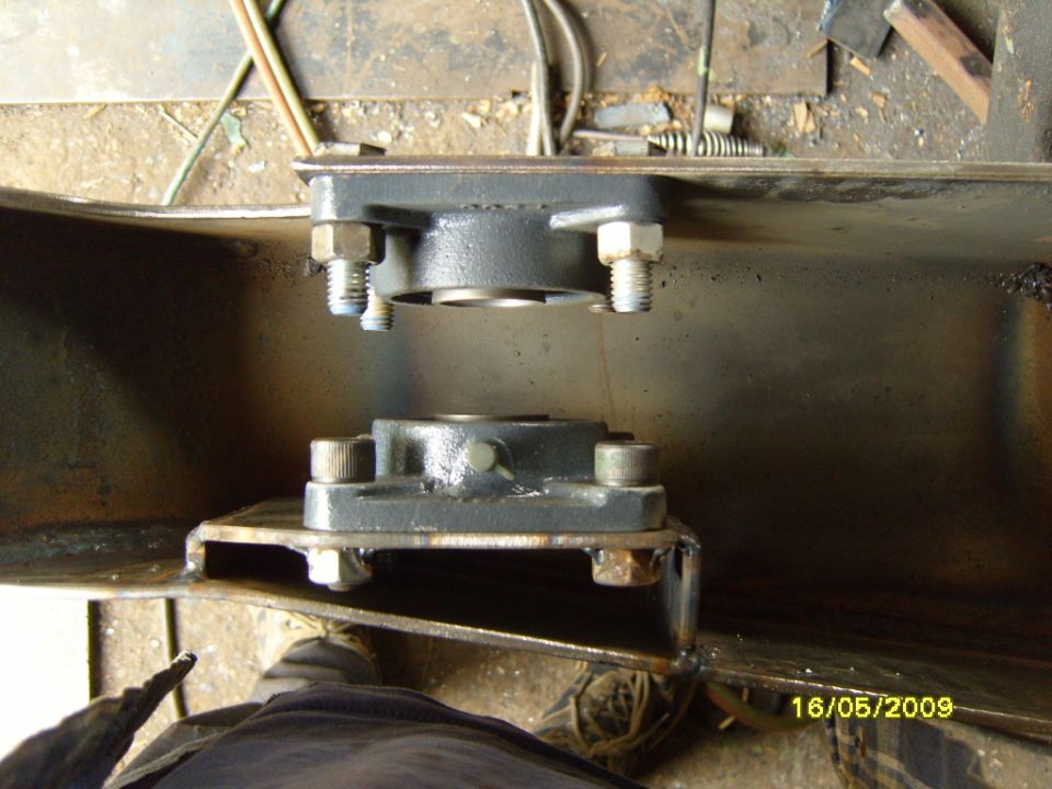 Two flange bearing assemblies mounted on metal brackets. Date stamp reads 16/05/2009